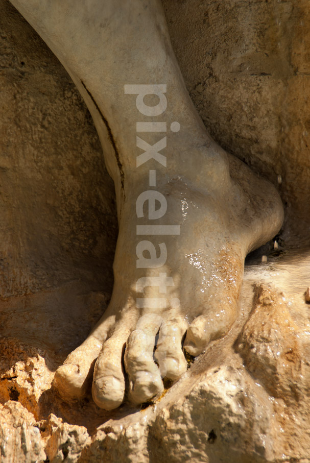 Detail of a statue's foot
